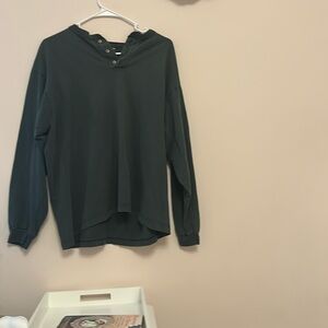 Green long sleeve with cute little buttons at the top so perfect for fall